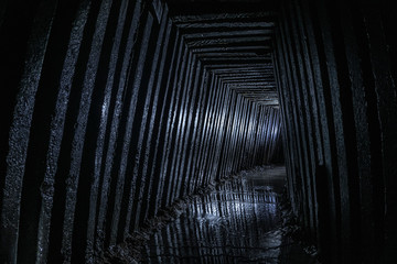 Underground tunnel that gets water out from soil. 