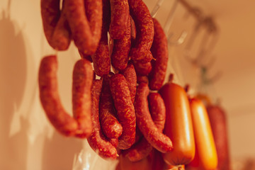 Traditional food. Smoked sausuages in smokehouse