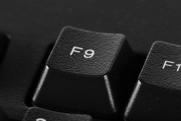 F9 key, computer keyboard background and texture, side view