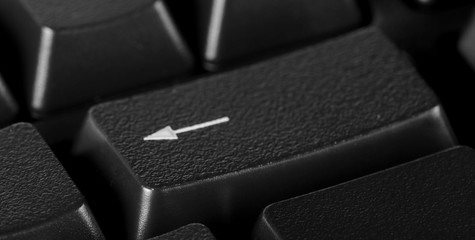 Enter key, computer keyboard, arrow button background and texture, side view