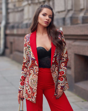 Woman in colorful red suit