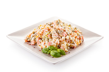 Vegetable mayonaise salad on white background