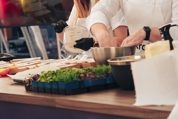 The chef of the Swedish company prepares food