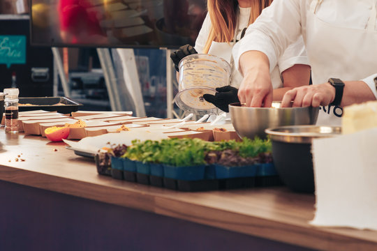 The chef of the Swedish company prepares food
