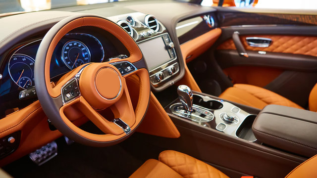 Brown leather interior of a luxury car