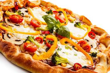 Pizza with pepper and champignon on white background