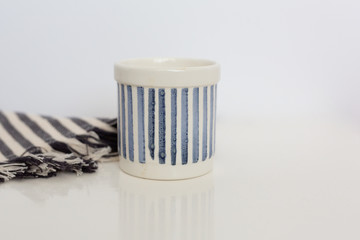 Blue and White Striped Ceramic Cup