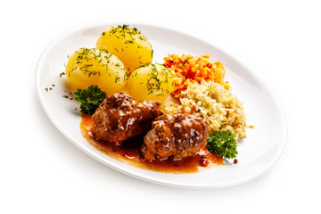 Wrapped pork chop with boiled potatoes