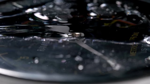 iquid flows down the manometer glass, forming a beautiful effect, similar to oil, but glycerin is usually poured into such sensors, close-up