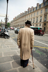 old man walking on the street