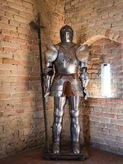 Knight in medieval armor with battle axe