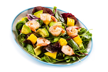 Salad with shrimps on white background