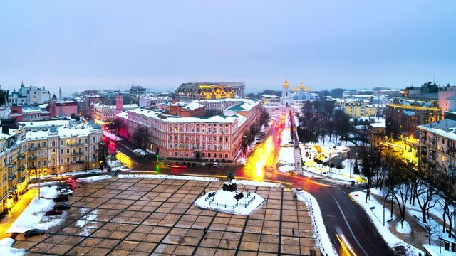 Kyiv, Ukraine. Video of sunset in Kyiv, Ukraine, with a view of the St Michaels Golden - Domed Monastery and traffic on a winter day with a gloomy sky