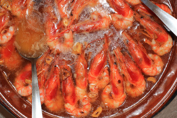 Fried shrimp in olive oil with garlic
