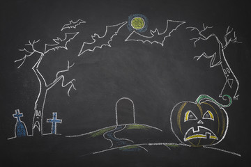 Drawing of a cemetery, pumpkin and bats on a chalk board. Trick or treat.
