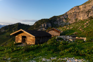 tyrol hut hütte in sunrise with mountains on the background