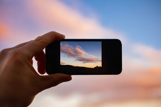 Simplicity - clouds seen through mobile phone screen
