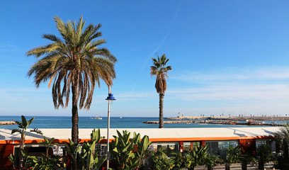 French Riviera - Menton - beach terrasses on the promenade