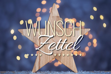 Text Wunschzettel vor Holzstern und leuchtendem Hintergrund