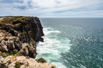 Fototapeta na wymiar Spectacular cliffs overlooking the Atlantic Ocean at Cape Sagres, Algarve, Portugal