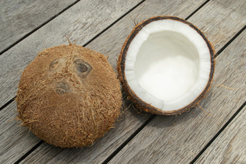 COCONUT COMPOSITION, COCONUT ON RUSTIC WOODEN PLANKS 