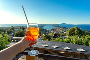 cocktail with scenic view of the croatian losinj islands in the kvarner gulf daytime