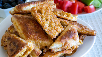 bread with eggs in a plate