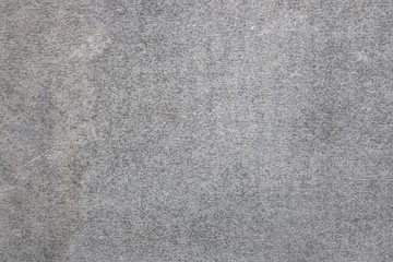 abstract background of old embossed painted gray wall