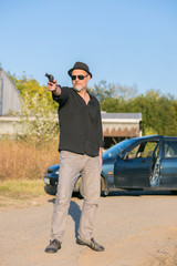 criminal battle on the street with gun replica