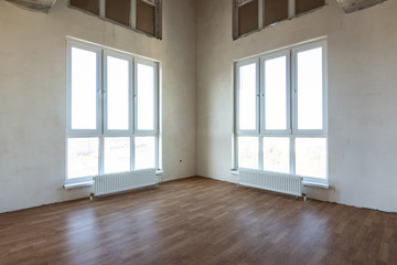 Room interior with two corner stained glass windows