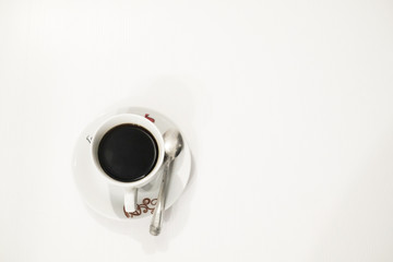 Good morning with a cup of coffee on white background
