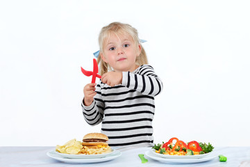 Little girl doesn't enjoy junk food.  Healthy food, especially vegetables full of vitamins are essential for the kid's menu.
