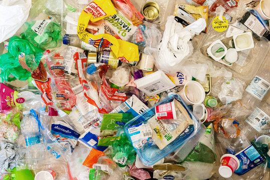 Heap of plastic garbage, food packaging that pollutes the environment.