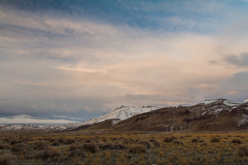 Morning clouds over snow-capped mountain in Oregon, USA