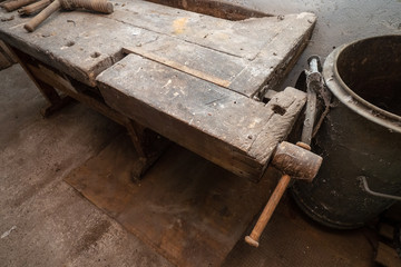 Traditional old workbench of a carpenter in his workshop in the Alpine region in Austria