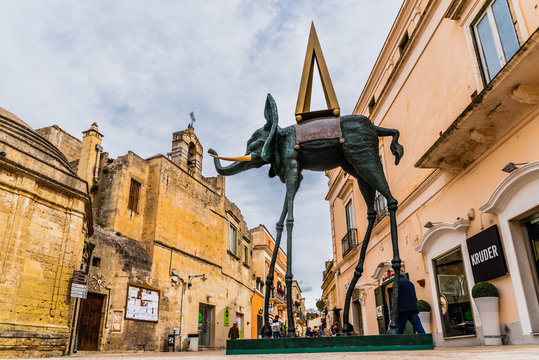 Matera, Italy - March 11, 2019: Replica of a sculpture of Dali, a deformed elephant, exposed on the street.