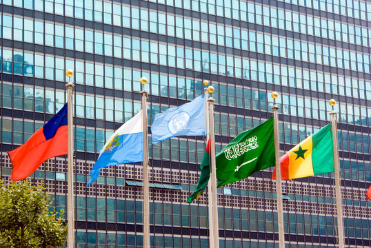New york, usa- August 15, 2008: Flag of the UN and other countries waving in front of the official headquarters building.