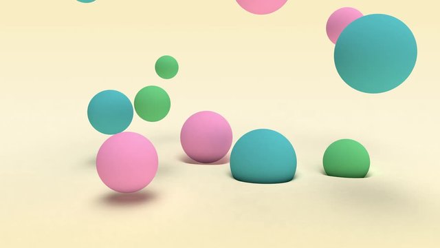 abstract 3D animation of many colored balls that jump on the cream surface.