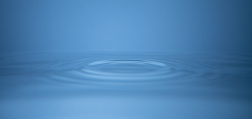 Concentric circles, ripples on still water surface, 