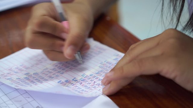 Educational researchers checking statistical in document, questionnaires about education and teaching. As well as satisfaction of students or customers in office.