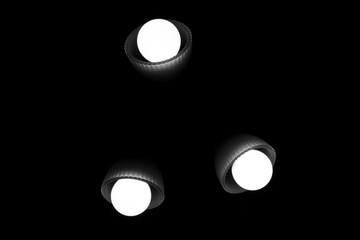  three lamps lit in black and white