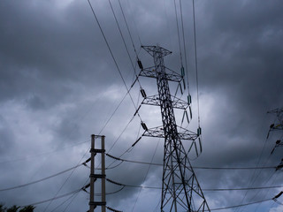 Dark Storm Clouds Before Rain and electricity poles