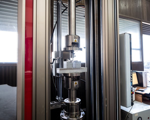 tensile strength tester machine in use.