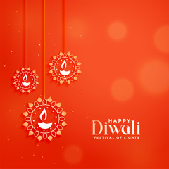 orange diwali festival card with hanging diya lamps
