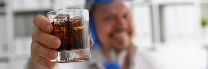 Man wearing suit and tie in goggles and snorkel hold in arm glass of cola at workplace in office closeup. Count days to leave annual day off workaholic resort idea ticket sale concept