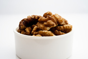 Walnut kernels isolated on white background