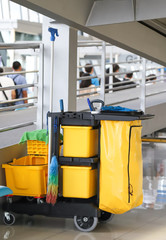 Closeup of janitorial, cleaning equipment and tools for floor cleaning. Vertical view.