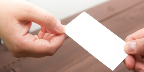 business executive exchanging business card blank. Copy space