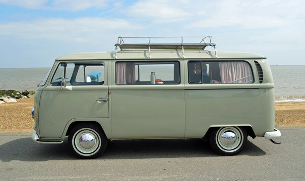 Classic Grey Camper Van Parked on Seafront Promenade