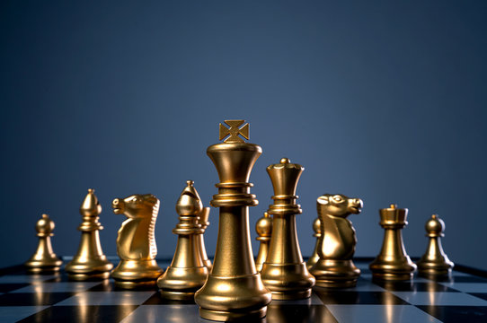A Man Hand with a Chess Piece in a Board Game. Opening of the Chess Game  with the Move of the White King Pawn E2-e4, Copy Space on Stock Image -  Image